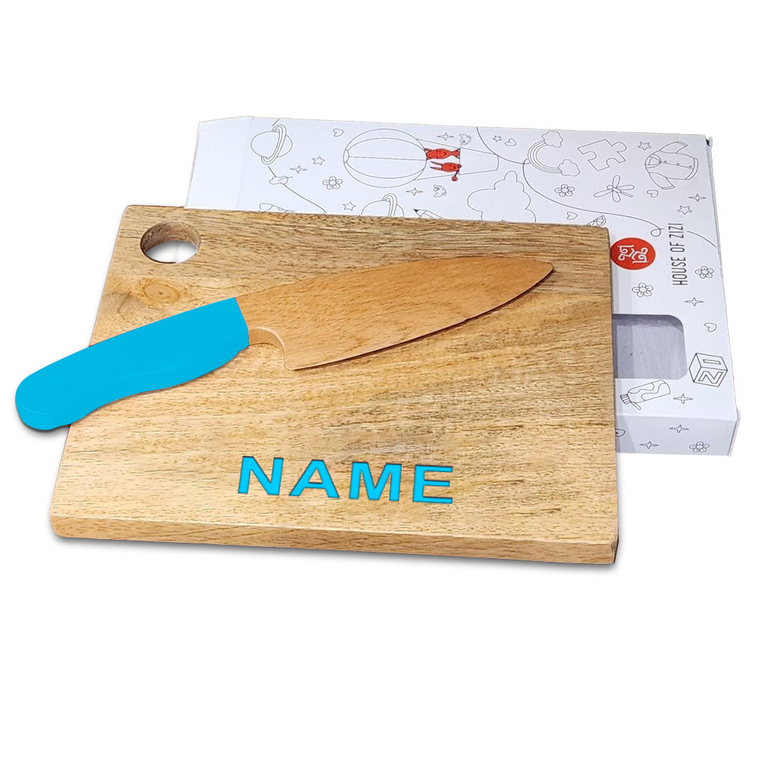 kids knife and wooden chopping board