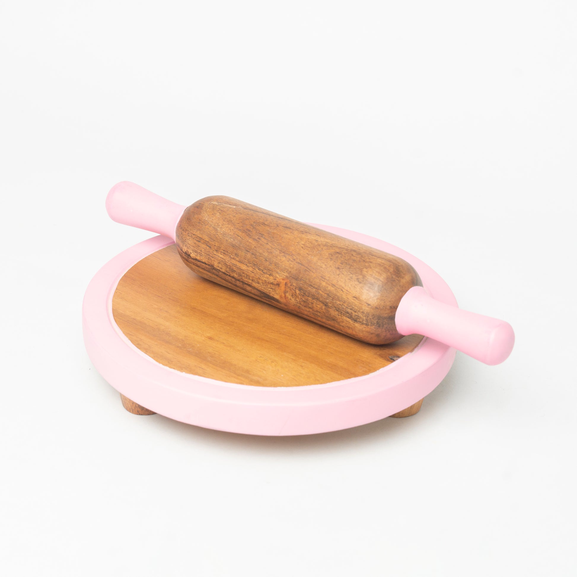 light pink wooden roti roller for kids